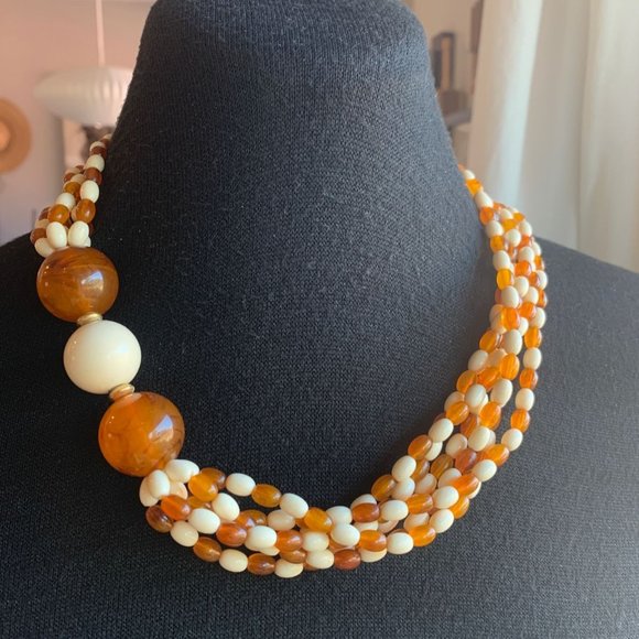Avon Jewelry - Avon Vintage 1987 Cosmopolitan Asymmetric Amber Ivory Acrylic Bead Necklace 22"